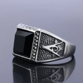 Detail of vintage Masonic ring with black gemstone and engraved AG symbol on silver band - US Size 8 / Steel