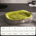 Size chart for thick oval pet bed with green plush lining and grey striped corduroy - M / Runway Design / Green