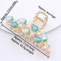 Pince à cheveux tulipe en alliage doré avec fleurs en émail bleu et perles blanches - HS02632 Bleu