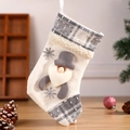 Christmas stocking with Santa Claus 3D doll and gray snowflake pattern on beige fabric - Santa Claus
