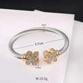 Detail of twisted cable bangle with cross motifs and exact size specifications - Gold Silver Contrast / Cross Flower