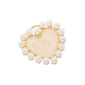 Macro shot of heart-shaped pendant with gold metal frame, white pearls and marble texture - VD1363 Gold Pearl Heart