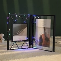 Cadre photo double pliable noir en métal avec guirlande LED et panneaux en verre - Lumière Multicolore 1,5m (Sans Pile) / Noir