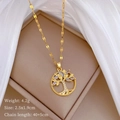 Detailed view of a gold Tree of Life necklace with sparkling crystals in a jewelry box - Gold Life Tree Style (C513)