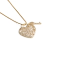 Gold plated heart and key pendant necklace with clear cubic zirconia on white background - 0379-Hollow Heart Lock and Key