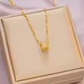 Elegant 18K gold plated titanium necklace featuring a sparkling zircon waist cylinder pendant - 6042 Cylinder Zircon / Gold