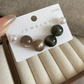 Detailed close-up of a 3-pair earring set with white pearls and resin beads on 925 silver pins - Mixed Color Round Bead Style / Silver Pin - Brown - Green