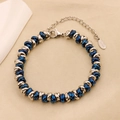 Men's hip hop titanium steel bracelet with silver and blue interlaced rings - Steel and Blue (B-56)