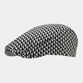 Detail view of British retro flat cap with black and white geometric triangle pattern - M (56-58cm) / Black