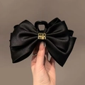 Large black satin double bow hair claw clip with elegant gold metallic logo buckle - Black Luxury Style Bow Claw Clip 13cm