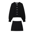 Elegant black knit two-piece set featuring a round neck cardigan and mini skirt - Set