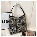 Chic hobo shoulder bag with leopard print pattern and black leather strap design - Leopard Black