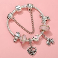 Detail of silver DIY charm bracelet with pink beads and Grandma engraved heart charm - Sl023318/1216-20