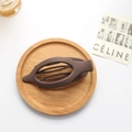 Matte coffee brown hair clip set on a wooden tray with a minimalist aesthetic style - Matte Coffee