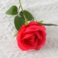 Single red velvet artificial rose stem with green leaves on white knit background - Freud (Silk Version)