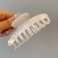Macro detail of white pearlescent acetate hair claw clip showing glossy shark fin design - Large Spine Shape Claw Clip (Style 10)