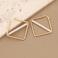 Detailed view of square gold earrings with diagonal rhinestone inlay on stone surface - Square Shape (3#)