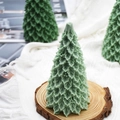 Green Christmas tree scented candle with intricate leaf textures for holiday decor - Large Cedar 754g