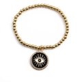 Pulsera de cuentas doradas con colgante de ojo turco en esmalte negro y detalles de circón - Negro