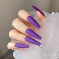 Close-up of matte purple extra-long coffin press-on nails on a white pearl mesh background - Purple Matte-Glossy(CBL-32)