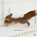 Realistic 30cm foam squirrel figurine with fluffy tail holding a natural pinecone - Large Running Squirrel Ornament