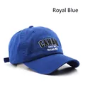 Royal blue vintage baseball cap featuring white embroidered Niagara Falls text - Sapphire Blue