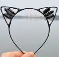 Detail of black crystal cat ear headband with wire-wrapped quartz and dark style accents - No.15 Black Crystal