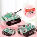 Macro detail of wind-up tin tank toys in green camouflage with classic H-08 model design - Tin Tank