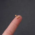 Minimalist gold stainless steel ear stud with four micro beads in a linear design - Gold Four-Bead Row Style (17#)