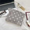 Detailed texture of grey corduroy makeup bag with white polka dots and woven label - Grey Polka Dot / Gray