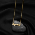 Golden Aquarius zodiac pendant necklace with elegant script font on a dark stone - Aquarius Gold