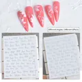 Holographic laser nail stickers with silver floral and script lettering patterns - Alphabet