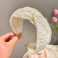 Elegant wide pearl headband featuring pleated white fabric and a twisted knot design - Girls Series-Triangle Knot Headband
