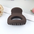 Brown matte hollow round claw clip for high ponytail on a clean white table background - Matte Brown