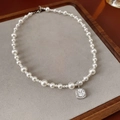 Elegant vintage pearl necklace featuring a silver square rhinestone pendant on a velvet tray - Gradient Pearl Zircon Pendant Necklace