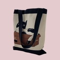 Detail of knitted tote bag with black cat in box print and contrast black handles - Beige Cat Black Base