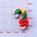 DIY Christmas resin candy cane accessory with red bow for creative crafts and jewelry - Candy Cane