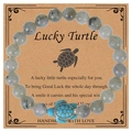 Handmade stretch bracelet with grey natural stone beads and blue turtle on a lucky card - Moonstone