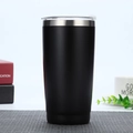 Sleek black 20oz double-walled stainless steel insulated tumbler with a clear lid on desk - Black