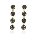 Detail of long drop earrings featuring four black enamel smiley faces and gold metal links - Black