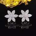 Elegant silver flower stud earrings with shimmering zircons on a black surface - Six-Petal Flower / Silver