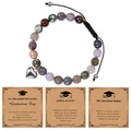 Detail of graduation crystal bracelets with heart pendants and motivational cards - The Adventure Begins Theme / India Agate