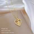 Macro detail of gold Virgin Mary heart pendant necklace with dimensions and weight info - Heart Virgin Mary Relief Rhinestone Style (C209)