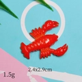Macro shot of 2.4x2.9cm red resin lobster charm for DIY crafts and shoe buckles - Lobster