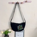 Black nylon dumpling bag with floral embroidery and adjustable shoulder strap - One Size / Black Floral