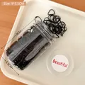 Barattolo con 100 elastici neri per capelli ad alta elasticità in bottiglia di plastica - 9x5,5cm in Scatola / Serie Nera (500 Pezzi)