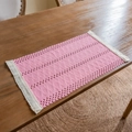 Pink bohemian crochet table runner with delicate hollow patterns and white fringe tassels - Woven Pink