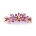 Macro shot of rose gold bow hair clip with purple rhinestones and crystal flower details - Style G / Purple