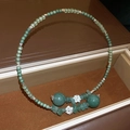 Detail view of green jade beads with silver lotus flowers in a jewelry gift box - Green Gravel Flower Decor Style (41#)