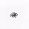 Macro detail of ladybug pendant with silver finish and green crystal inlay - Silver Green Zirconia